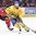 MONTREAL, CANADA - JANUARY 4: Canada's Thomas ChabotÂ #5 stick checks Sweden's Rasmus Dahlin #8 during semifinal round action at the 2017 IIHF World Junior Championship. (Photo by Matt Zambonin/HHOF-IIHF Images)

